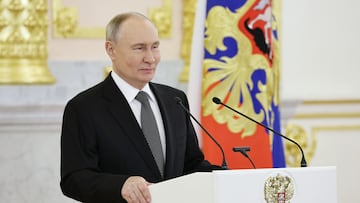 In this pool photograph distributed by the Russian state agency Sputnik, Russia's President Vladimir Putin gives a speech during a state awards ceremony for Russian Paralympians, medallists from the Paris 2024 Paralympic Games at the Kremlin in Moscow on December 16, 2024. (Photo by Kristina Kormilitsyna / POOL / AFP)