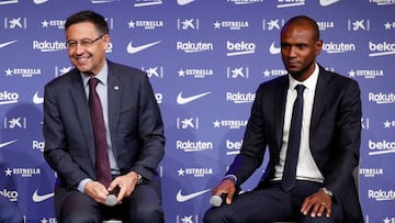Josep María Bartomeu y Eric Abidal.