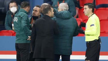 Soccer Football - Champions League - Group H - Paris St Germain v Istanbul Basaksehir F.K. - Parc des Princes, Paris, France - December 8, 2020 Fourth official Sebastian Coltescu with Istanbul Basaksehir assistant coach Pierre Webo and referee Ovidiu Hate