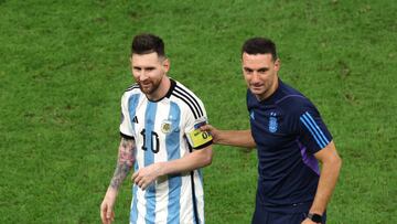 LUSAIL CITY, QATAR - DECEMBER 09: Lionel Scaloni, Head Coach of Argentina, celebrates with Lionel Messi after the win in the penalty shootout during the FIFA World Cup Qatar 2022 quarter final match between Netherlands and Argentina at Lusail Stadium on December 09, 2022 in Lusail City, Qatar. (Photo by Alexander Hassenstein/Getty Images)