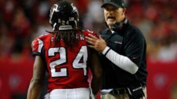  Devonta Freeman y el head coach de Atlanta Falcons Dan Quinn.