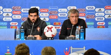 Portugal's coach Fernando Santos (R) and defender Luis Neto hold a press conference at Krestovsky Stadium in Saint Petersburg on June 23, 2017, on the eve of the 2017 FIFA Confederations Cup group A football match between New Zealand and Portugal.