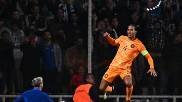 Netherlands' defender #04 Virgil van Dijk celebrates after scoring his team's first goal on a penalty during the Euro 2024 qualifying group B football match between Greece and Netherlands at OPAP Arena in Athens, on October 16, 2023. (Photo by Angelos TZORTZINIS / AFP)