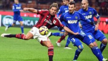 Alessio Cerci disputa el balón con Alessandro Longhi y Paolo Cannavaro