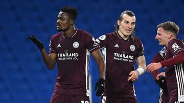 06 March 2021, United Kingdom, Brighton: Leicester City&#039;s Daniel Amartey (L) celebrates scoring their side&#039;s second goal during the English Premier League soccer match between Brighton &amp; Hove Albion and Leicester City at the American Express