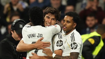 Soccer Football - LaLiga - Real Madrid v Real Betis - Santiago Bernabeu, Madrid, Spain - January 4, 2026 Real Madrid's Gonzalo Garcia celebrates scoring their second goal with Vinicius Junior and Rodrygo REUTERS/Violeta Santos Moura