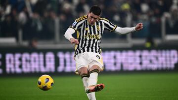 Juventus' Serbian forward #09 Dusan Vlahovic kicks the ball during the Italian Serie A football match between Juventus and Napoli, at The Allianz Stadium, in Turin on December 8, 2023. (Photo by Marco BERTORELLO / AFP)