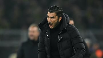 Borussia Dortmund's Turkish head coach Nuri Sahin reacts during the UEFA Champions League football match between Borussia Dortmund and FC Barcelona in Dortmund, western Germany on December 11, 2024. (Photo by INA FASSBENDER / AFP)