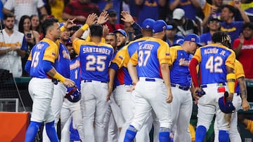 MIAMI, FLORIDA - MARCH 14: Anthony Santander #25 of Team Venezuela celebrates with teammates after scoring a run against Team Nicaragua during the fourth inning in a World Baseball Classic Pool D game at loanDepot park on March 14, 2023 in Miami, Florida.   Megan Briggs/Getty Images/AFP (Photo by Megan Briggs / GETTY IMAGES NORTH AMERICA / Getty Images via AFP)