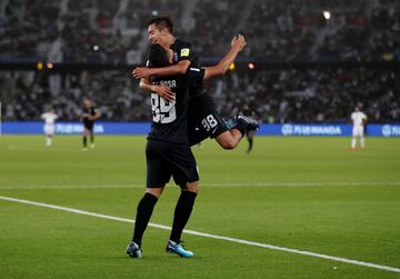 Soccer Football - FIFA Club World Cup Third Place Match - Al Jazira vs CF Pachuca - Zayed Sports City Stadium, Abu Dhabi, United Arab Emirates - December 16, 2017  Pachuca's Roberto Carlos de la Rosa celebrates with Erick Sanchez after scoring their third goal     REUTERS/Matthew Childs