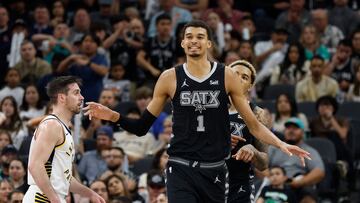 Victor Wembanyama #1 of the San Antonio Spurs is all smiles after making a score against the Indiana Pacers in the first half at Frost Bank Center on March 3, 2024 in San Antonio, Texas.