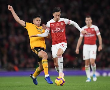 Mesut Özil in action for Arsenal against Wolves.