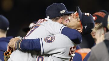 NEW YORK, NEW YORK - OCTOBER 23: Jose Altuve #27 and Yuli Gurriel #10 of the Houston Astros celebrate after defeating the New York Yankees in game four to win the the American League Championship Series at Yankee Stadium on October 23, 2022 in the Bronx borough of New York City.   Sarah Stier/Getty Images/AFP