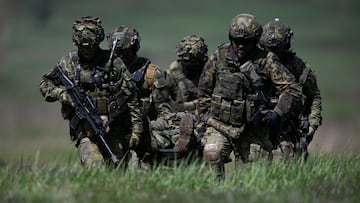 Soldiers take part in the NATO multinational battle group military exercise 'Joint Allied Power Demonstration Day', at a military training area in Lest, near Zvolen, Slovakia April 25, 2024. REUTERS/Radovan Stoklasa