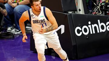 Luka Doncic put up 35 points in the Mavericks season opener against the Phoenix Suns, but they blew a 22-point lead and lost 107-105.