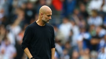 Soccer Football - Premier League - Brighton & Hove Albion v Manchester City - The American Express Community Stadium, Brighton, Britain - August 31, 2025 Manchester City manager Pep Guardiola looks dejected after the match Action Images via Reuters/Matthew Childs EDITORIAL USE ONLY. NO USE WITH UNAUTHORIZED AUDIO, VIDEO, DATA, FIXTURE LISTS, CLUB/LEAGUE LOGOS OR 'LIVE' SERVICES. ONLINE IN-MATCH USE LIMITED TO 120 IMAGES, NO VIDEO EMULATION. NO USE IN BETTING, GAMES OR SINGLE CLUB/LEAGUE/PLAYER PUBLICATIONS. PLEASE CONTACT YOUR ACCOUNT REPRESENTATIVE FOR FURTHER DETAILS..
