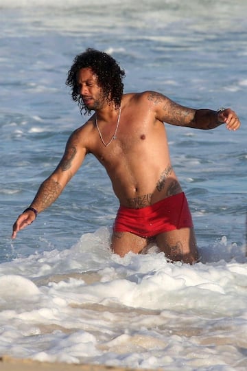 Marcelo relaxes with his family at the beach in Rio de Janeiro.