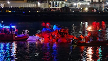 An AA passenger jet collided with a US Army Black Hawk helicopter moments before landing at Ronald Reagan National Airport in Washington.