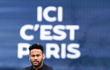 Paris Saint-Germain's Brazilian forward Neymar looks on as he takes part in a training session in Saint-Germain-en-Laye, west of Paris.