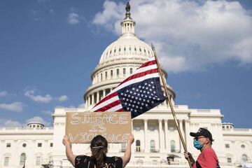 People gather at the U.S. Capitol during a peaceful protest against police brutality on June 4, 2020 in Washington, DC.