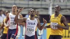 Tyson Gay (centro) vence a Usain Bolt en los 200 metros de los Mundiales de Osaka 2007. 