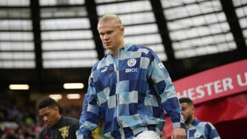 MANCHESTER, ENGLAND - JANUARY 14: Erling Haaland of Manchester City walks out onto the pitch prior to the Premier League match between Manchester United and Manchester City at Old Trafford on January 14, 2023 in Manchester, England. (Photo by Tom Flathers/Manchester City FC via Getty Images)