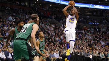 Nov 18, 2016; Boston, MA, USA; Golden State Warriors forward Kevin Durant (35) shoots over Boston Celtics center Kelly Olynyk (41), Boston Celtics forward Amir Johnson (90) and Boston Celtics guard Avery Bradley (0) during the first half at TD Garden. Mandatory Credit: Winslow Townson-USA TODAY Sports