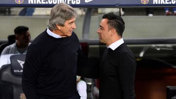 Manuel Pellegrini y Xavi Hernández, entrenadores del Betis y Barcelona respectivamente.