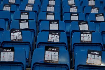 Santiago Bernabeu, Madrid, Spain - August 19, 2018 | General view of leaflets on stadium seats explaining VAR.