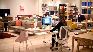 SANTA FE, NEW MEXICO - JANUARY 14, 2020: An employee works at her computer in a home and office furniture and accessory store in Santa Fe, New Mexico. (Photo by Robert Alexander/Getty Images)