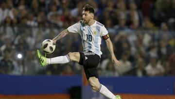 FILE - In this May 29, 2018, file photo, Argentina's Lionel Messi controls the ball during a friendly soccer match between Argentina and Haiti at the Bombonera stadium in Buenos Aires, Argentina. Lionel Messi and Cristiano Ronaldo have split the last 10 FIFA Player of the Year awards, and this is likely their last chance to win a World Cup. (AP Photo/Natacha Pisarenko, File)