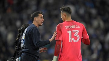SAN DIEGO, CALIFORNIA - NOVEMBER 29: Mikey Varas, Head Coach of the San Diego FC, speaks with Pablo Sisniega #13 during the Audi 2025 MLS Cup western conference final match between San Diego FC and Vancouver Whitecaps FC at Snapdragon Stadium on November 29, 2025 in San Diego, California. Orlando Ramirez/Getty Images/AFP (Photo by Orlando Ramirez / GETTY IMAGES NORTH AMERICA / Getty Images via AFP)