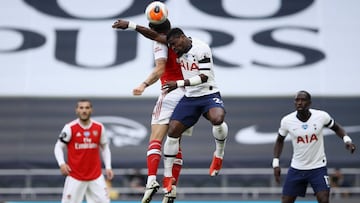 LONDON, ENGLAND - JULY 12: Granit Xhaka of Arsenal  battles for possession with  Serge Aurier of Tottenham Hotspur  during the Premier League match between Tottenham Hotspur and Arsenal FC at Tottenham Hotspur Stadium on July 12, 2020 in London, England. 