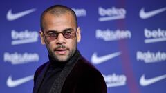 (FILES) New FC Barcelona's Brazilian defender Dani Alves, looks on during his presentation ceremony at the Camp Nou stadium in Barcelona on November 17, 2021. A Spanish court on February 22, 2024 sentenced former Brazil international Dani Alves to four and a half years in prison after finding him guilty of raping a young woman at a Barcelona nightclub in December 2022. (Photo by Pau BARRENA / AFP)