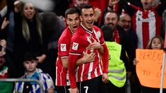 Athletic Bilbao's Spanish forward #07 Alex Berenguer (R) celebrates scoring his team's second goal, with Athletic Bilbao's Spanish midfielder #16 Inigo Ruiz de Galarreta, during the Spanish league football match between Athletic Club Bilbao and Real Sociedad at the San Mames stadium in Bilbao on January 13, 2024. (Photo by ANDER GILLENEA / AFP)