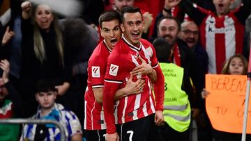 Athletic Bilbao's Spanish forward #07 Alex Berenguer (R) celebrates scoring his team's second goal, with Athletic Bilbao's Spanish midfielder #16 Inigo Ruiz de Galarreta, during the Spanish league football match between Athletic Club Bilbao and Real Sociedad at the San Mames stadium in Bilbao on January 13, 2024. (Photo by ANDER GILLENEA / AFP)