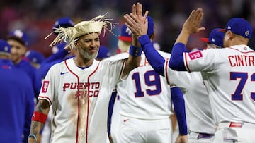 SAN JUAN, PUERTO RICO - MARCH 09: Eddie Rosario #17 of Team Puerto Rico celebrates with teammates a 4-1 victory against Team Cuba after the game during the 2026 World Baseball Classic at Hiram Bithorn Stadium on March 09, 2026 in San Juan, Puerto Rico. Al Bello/Getty Images/AFP (Photo by AL BELLO / GETTY IMAGES NORTH AMERICA / Getty Images via AFP)