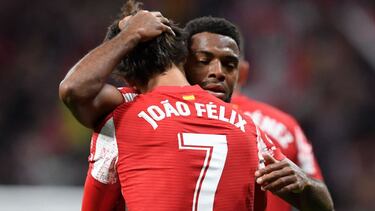Atletico Madrid's French midfielder Thomas Lemar (R) celebrates with Atletico Madrid's Portuguese midfielder Joao Felix after scoring a goal during the Spanish League football match between Club Atletico de Madrid and FC Barcelona at the Wanda M