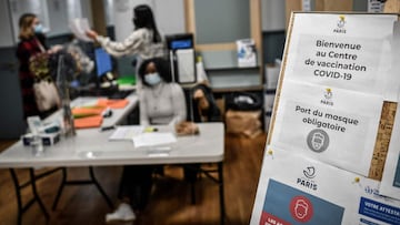 A picture shows an information board as people register before receiving a dose of a Covid-19 vaccine at a temporary vaccination centre in Paris, on November 27, 2021, amid the Covid-19 (novel coronavirus) pandemic.