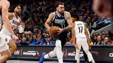 DALLAS, TEXAS - DECEMBER 16: Luka Doncic #77 of the Dallas Mavericks drives to the basket against the Portland Trail Blazers in the second half of the game at American Airlines Center on December 16, 2022 in Dallas, Texas. NOTE TO USER: User expressly acknowledges and agrees that, by downloading and or using this photograph, User is consenting to the terms and conditions of the Getty Images License Agreement. Tim Heitman/Getty Images/AFP (Photo by Tim Heitman / GETTY IMAGES NORTH AMERICA / Getty Images via AFP)