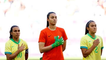 Paris 2024 Olympics - Football - Women's Group C - Nigeria vs Brazil - Bordeaux Stadium, Bordeaux, France - July 25, 2024. Marta of Brazil, Lorena of Brazil and Antonia of Brazil line up during the national anthems before the match. REUTERS/Susana Vera
