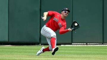 Diving for a fly ball in center field, Adam Duvall injures the same wrist that he had surgery on, leaving Boston in a precarious position.