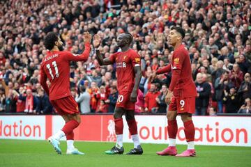 Salah, Sané y Firmino celebran un gol del Liverpool.