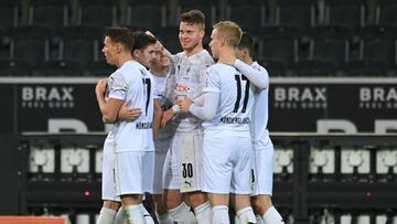 MOENCHENGLADBACH, GERMANY - JANUARY 19: Nico Elvedi of Borussia Monchengladbach celebrates with team mates after scoring their side&#039;s first goal during the Bundesliga match between Borussia Moenchengladbach and SV Werder Bremen at Borussia-Park on Ja