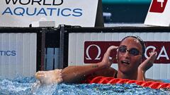 Italy's Simona Quadarella reacts after winning the final of the women's 1500m freestyle swimming event during the 2024 World Aquatics Championships at Aspire Dome in Doha on February 13, 2024. (Photo by Jewel SAMAD / AFP)