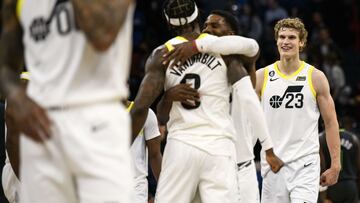 MINNEAPOLIS, MN - OCTOBER 21: Lauri Markkanen #23 of the Utah Jazz looks on as Jarred Vanderbilt #8 and Malik Beasley #5 celebrate after the game against the Minnesota Timberwolves at Target Center on October 21, 2022 in Minneapolis, Minnesota. NOTE TO USER: User expressly acknowledges and agrees that, by downloading and or using this photograph, User is consenting to the terms and conditions of the Getty Images License Agreement. The Jazz defeated the Timberwolves 132-126.   Stephen Maturen/Getty Images/AFP