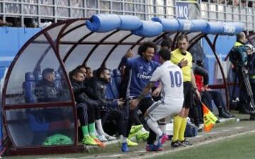 James Rodríguez celebrates with Marcelo.