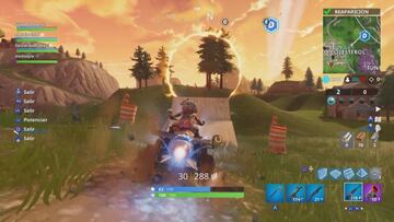 Atravesamos a toda velocidad uno de los círculos llameantes montados en un quad