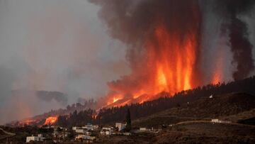 -- AFP PICTURES OF THE YEAR 2021 --
 
 Mount Cumbre Vieja erupts in El Paso, spewing out columns of smoke, ash and lava as seen from Los Llanos de Aridane on the Canary island of La Palma on September 19, 2021. - The Cumbre Vieja volcano erupted on Spain&