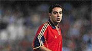 <B>EL ALUMNO Y EL MAESTRO</B>. Xavi aprendió durante años de Guardiola en el Barcelona.